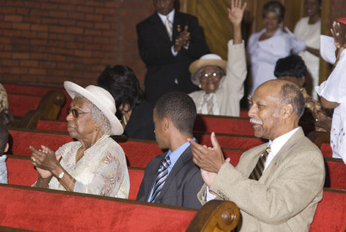9-Mrs. Jessie Wood (hand raised), the Most Senior Member of FBC, Received Applause 